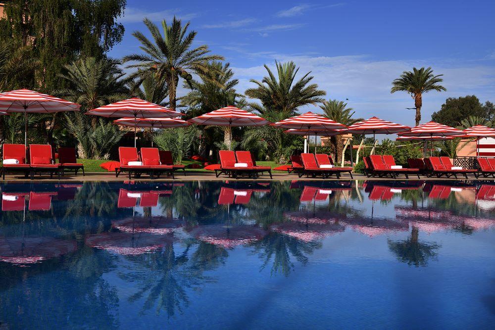 Moevenpick Hotel Mansour Eddahbi Marrakech Marrakesh Esterno foto The pool at the hotel